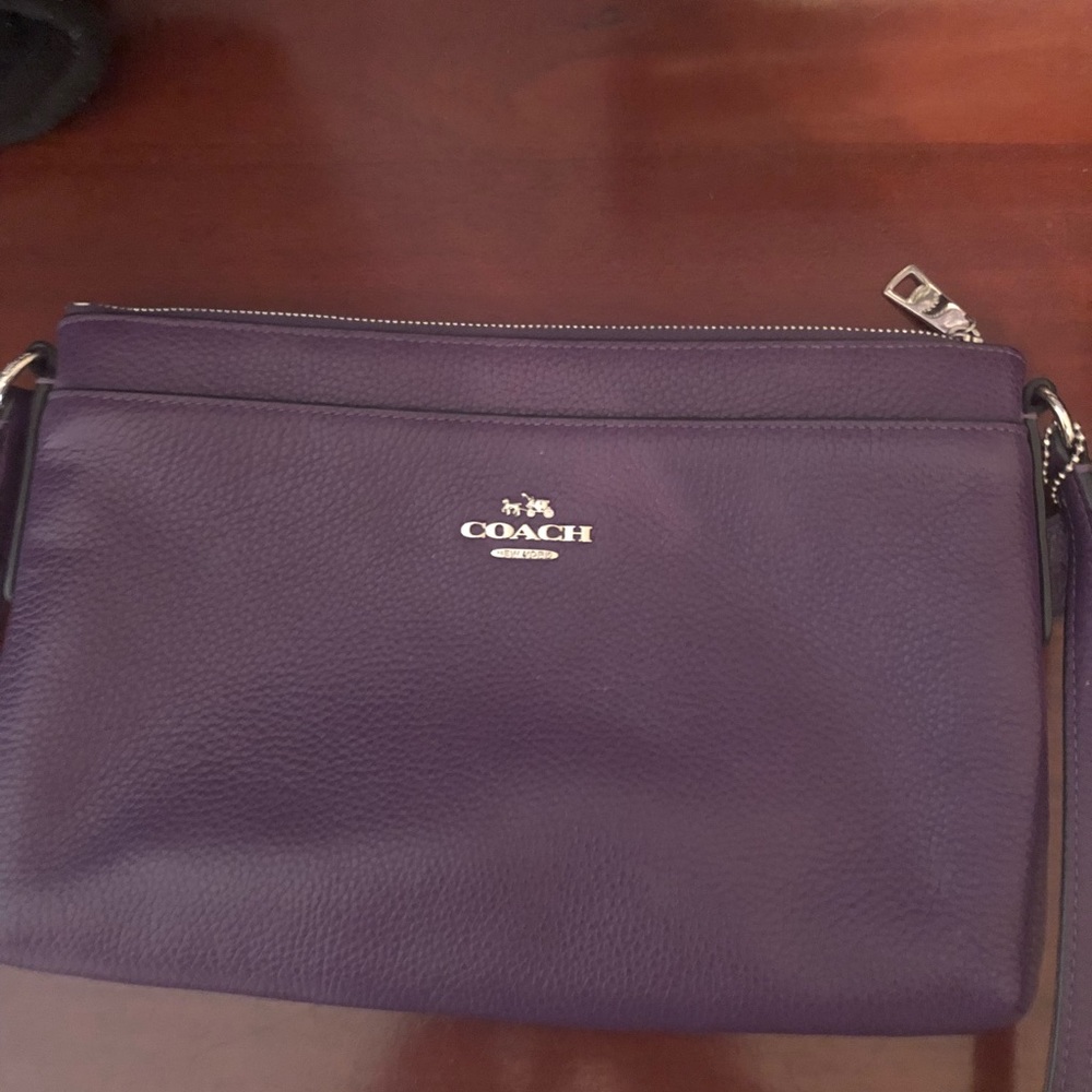 Purple Coach cross body bag